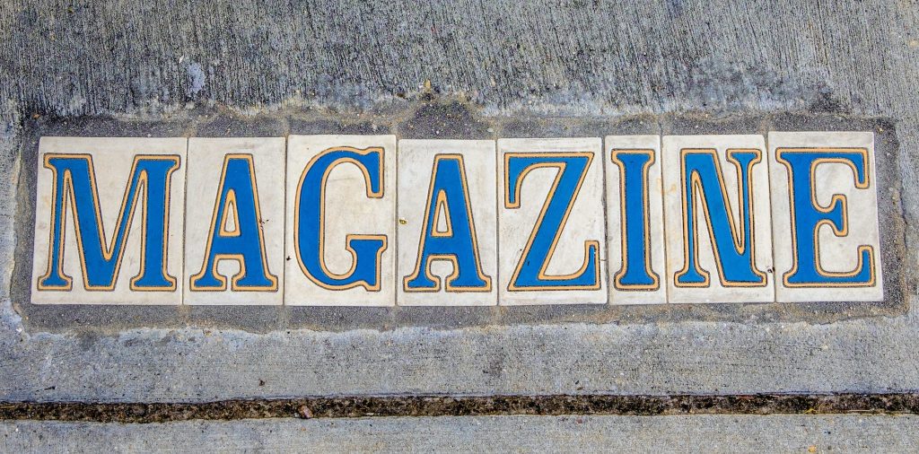 Sidewalk sign for Magazine Street in New Orleans, Louisiana